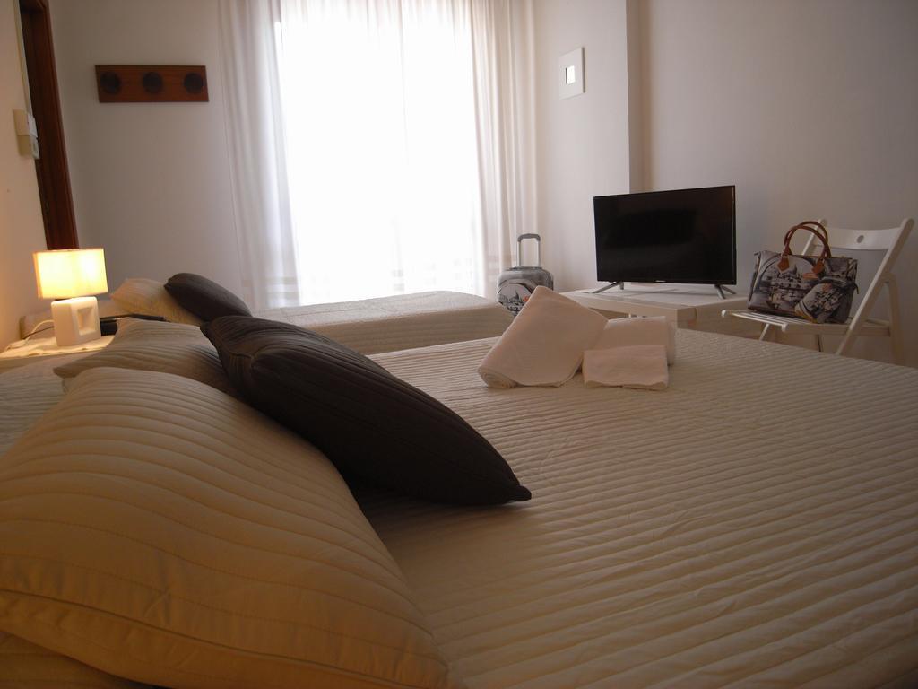 Hotel Moreri Grado Cameră foto