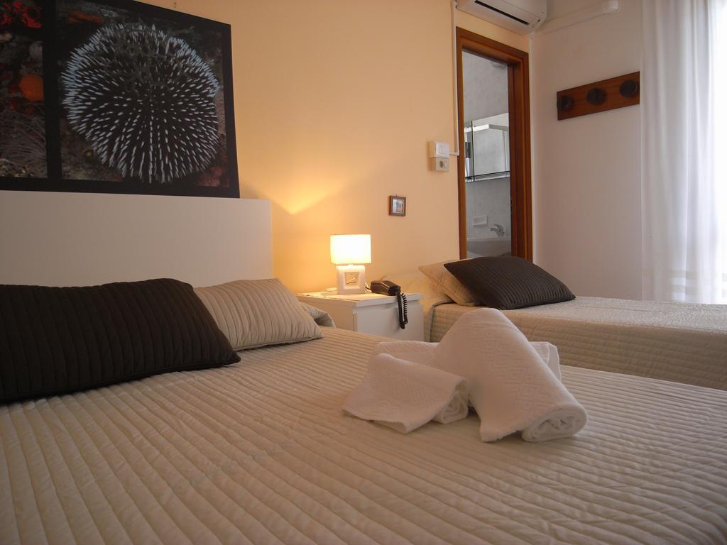 Hotel Moreri Grado Cameră foto