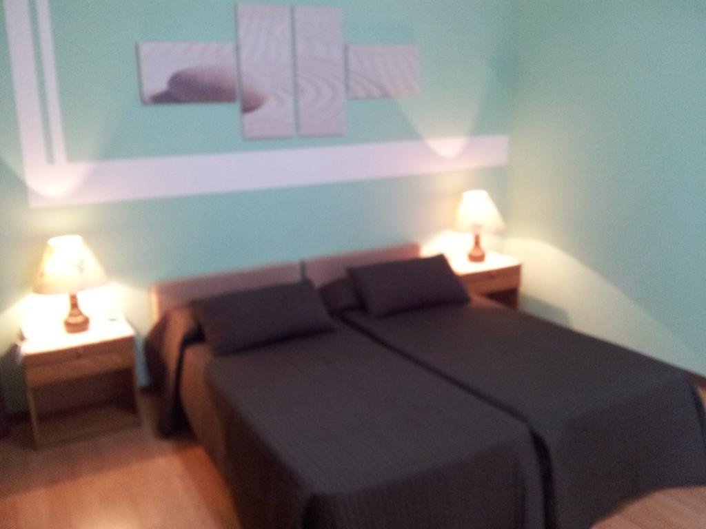 Hotel Moreri Grado Cameră foto